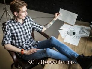 A0TattooedTomas